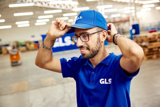 middle-aged-man-holding-hard-hat